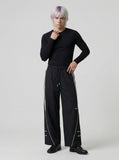 DAXUEN Wide-leg track pants in solid colors — model photo