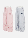 DAXUEN Wide-leg track pants with unique patterns