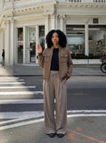 DAXUEN Women's wide-leg trousers in black and taupe — model photo
