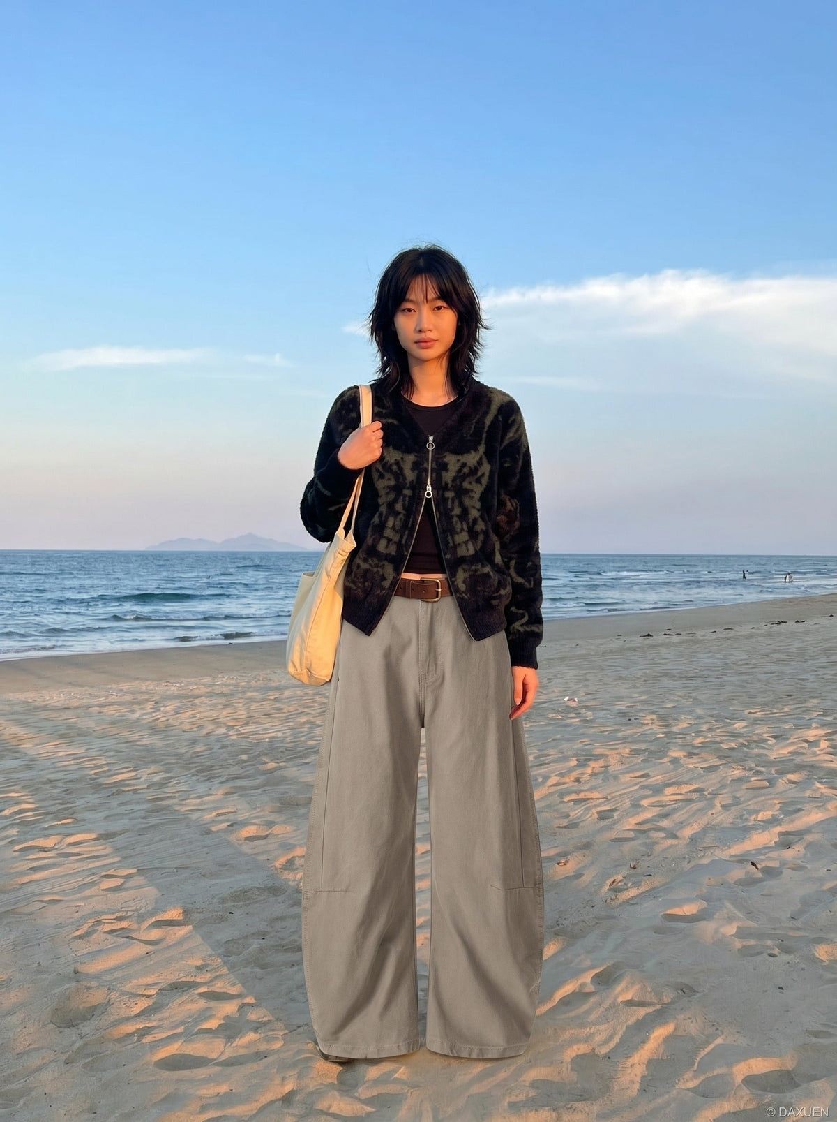 DAXUEN Wide-leg trousers in light khaki color — model photo