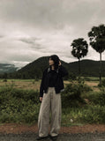 DAXUEN Wide-leg trousers in light khaki color — model photo
