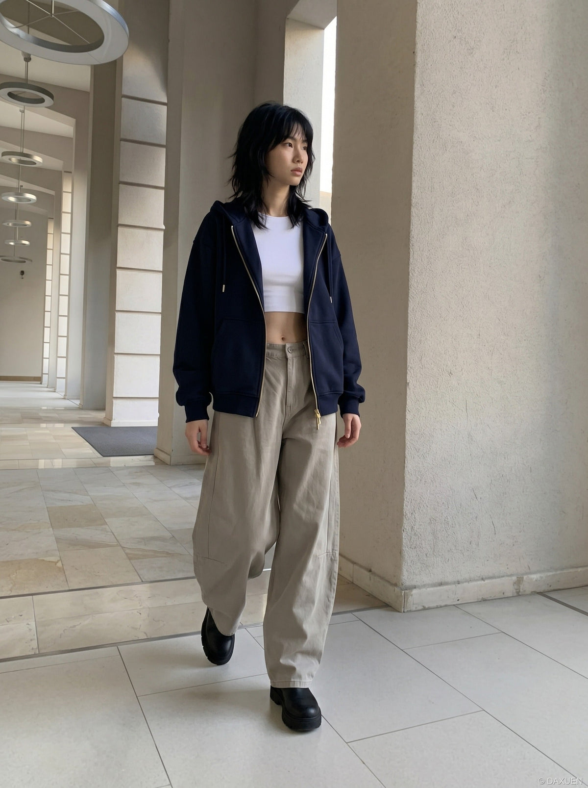 DAXUEN Wide-leg trousers in light khaki color — model photo