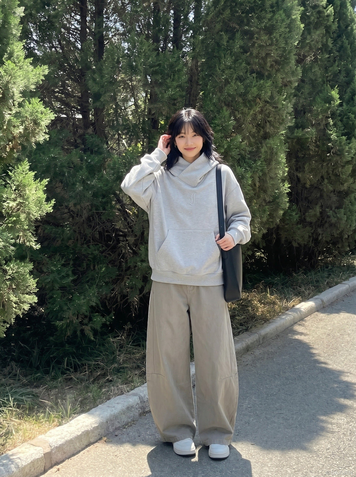 DAXUEN Wide-leg trousers in light khaki color — model photo