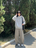 DAXUEN Wide-leg trousers in light khaki color — model photo