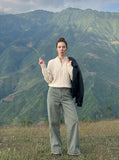 DAXUEN Loose-fitting wide-leg trousers in khaki and sage green — model photo