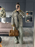 DAXUEN Loose-fitting wide-leg trousers in khaki and sage green — model photo