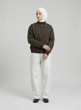 DAXUEN white wide-leg denim trousers with contrast stitching — model photo