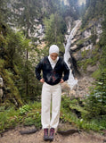 DAXUEN white wide-leg denim trousers with contrast stitching — model photo