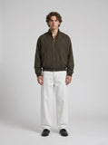 DAXUEN white wide-leg denim trousers with contrast stitching — model photo
