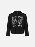 DAXUEN black textured knit top with winged and cloaked graphics