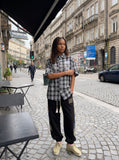 DAXUEN plaid oversized shirt with winged creature embroidery — model photo