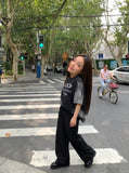 DAXUEN Oversized crew neck t-shirt with wing graphics — model photo