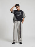 DAXUEN Oversized crew neck t-shirt with wing graphics — model photo