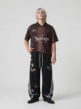 DAXUEN Short-sleeved striped polo shirt with graphics — model photo
