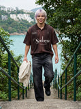 DAXUEN Short-sleeved striped polo shirt with graphics — model photo