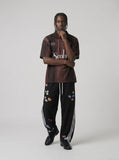 DAXUEN Short-sleeved striped polo shirt with graphics — model photo
