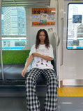 DAXUEN Oversized Cartoon Dogs Graphic Tee — model photo