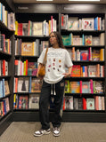 DAXUEN Oversized Cartoon Dogs Graphic Tee — model photo