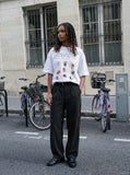 DAXUEN Oversized Cartoon Dogs Graphic Tee — model photo