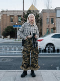 DAXUEN woodland camouflage wide-leg cargo pants — model photo