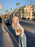 DAXUEN light blue faded wide-leg denim jeans — model photo