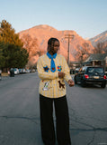 DAXUEN yellow blue plaid oversized shirt with dog tie — model photo