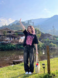 DAXUEN Loose-fitting crew neck t-shirt with graphic — model photo