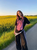 DAXUEN Loose-fitting crew neck t-shirt with graphic — model photo