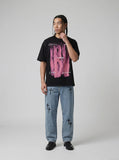 DAXUEN Loose-fitting crew neck t-shirt with graphic — model photo
