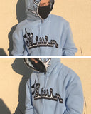 A model wearing the sky blue color of the Y2K Full Zip Hoodies