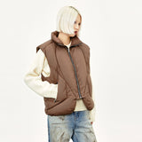 Model wearing the coffee Y2k Cotton Padded Vest in a gray background 
