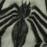 Details of green Loose Spider print Fleece Zip-up Jacket showing the spider print