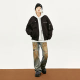 Model wearing the black Retro Classic Multi-Pocket Bomber Jacket in a gray background 