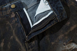 Waxed Distressed Denim Jeans