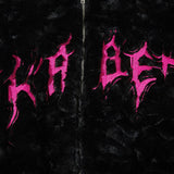 Details of the Fuzzy Black Jacket showing letter print