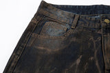 Waxed Distressed Denim Jeans