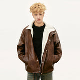 Model wearing the coffee Vintage Washed PU Leather Jacket in a gray background 