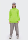 Girl wearing fluorescent green Knitted Turtleneck Sweater