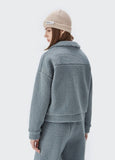 A girl wearing gray blue DAXUEN Lambs Wool Thick Set